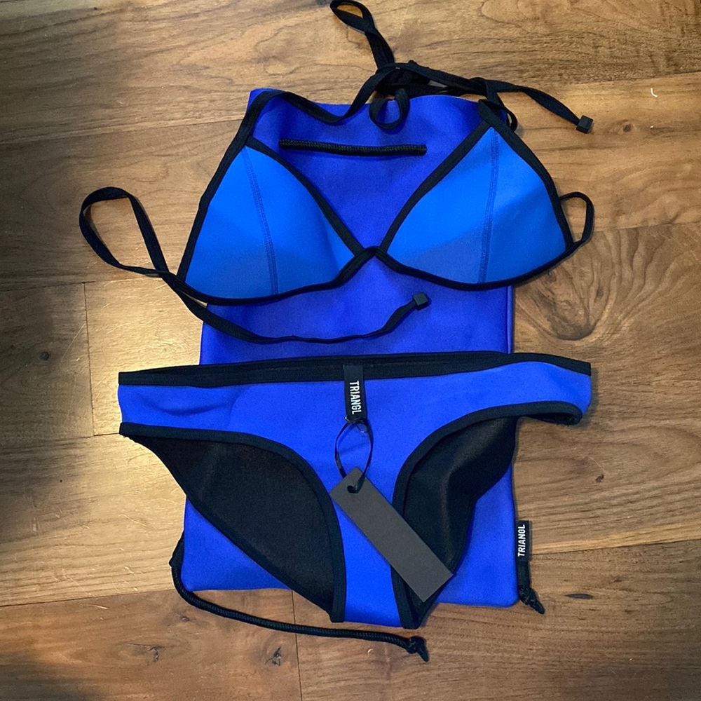 Triangl Bikini NWOT - top is size medium and bottoms are size large.